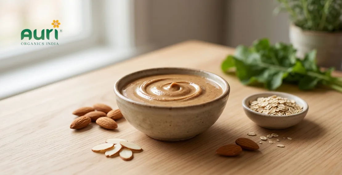 almond butter in bowl with whole almonds showing healthy nutrition